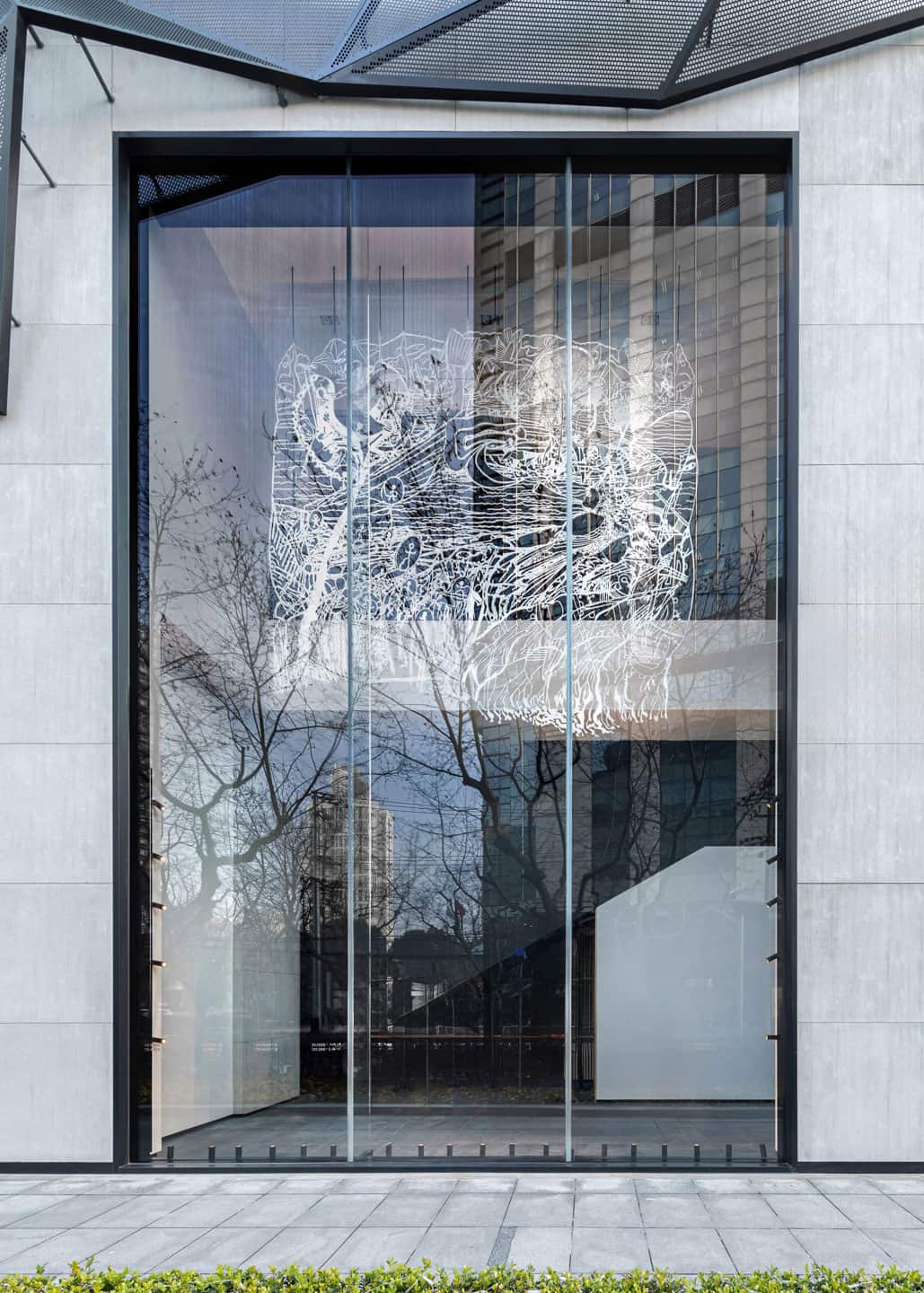 <u>Alex Fischer</u> &amp; <u>Qavavau Manumie</u>, <em>ᐃᒻᒪᕕᒻᒥ Upon the Sea 海上</em>, 2021, ≅15'×15' water cut aluminium, white paint. on display at iAPM, Shanghai, China